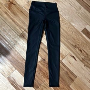 Black shine high rise full length XS legging. Material has a sheen to it.